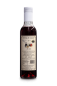 Preview: Flasche mit schwarzem Johannisbeer-Sirup auf hellem Hintergrund